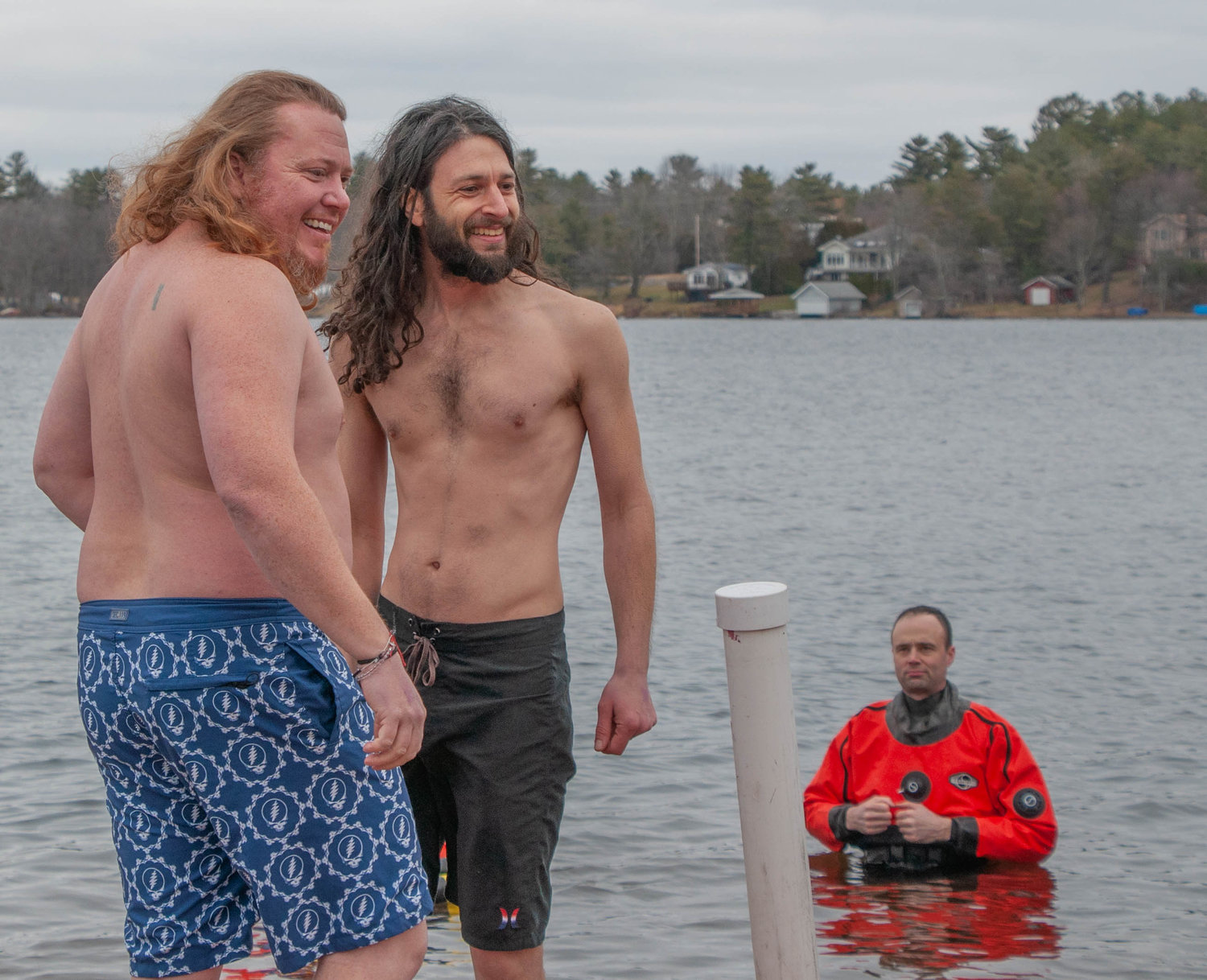 Team Hector's members Uriah Conklin, left, and Jake Friehling didn't look too cold before leaping into the freezing waters of White Lake last Saturday. Then they were cold...The jump was part of the "Sullivan County Freeze for the Cure" event that benefited the Alzheimer's Association.